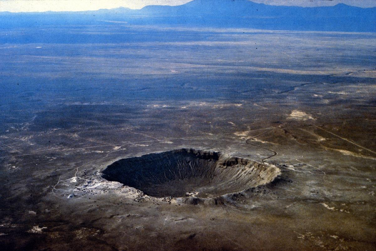 Meteor Crater in Arizona, created 50,000 years ago by an impactor only 160 feet (50 meters) across, evinces that the accretion of the solar system is not over. (<a href="http://en.wikipedia.org/wiki/File:Meteor.jpg" target="_blank" rel="noopener">D. Roddy/U.S. Geological Survey</a>)