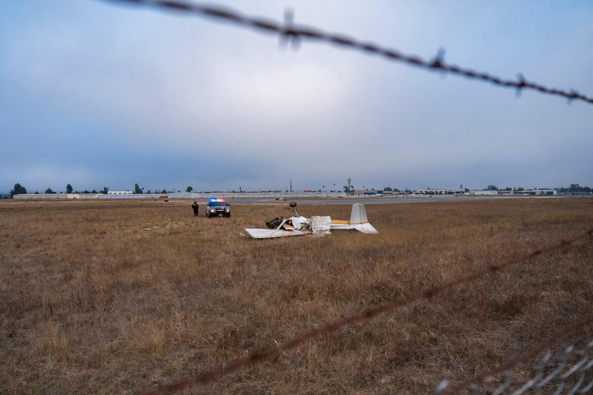 Wreckage from a plane crash lies in a field at Watsonville Municipal Airport in Watsonville, Calif., on Aug. 18, 2022. (Nic Coury/AP Photo)