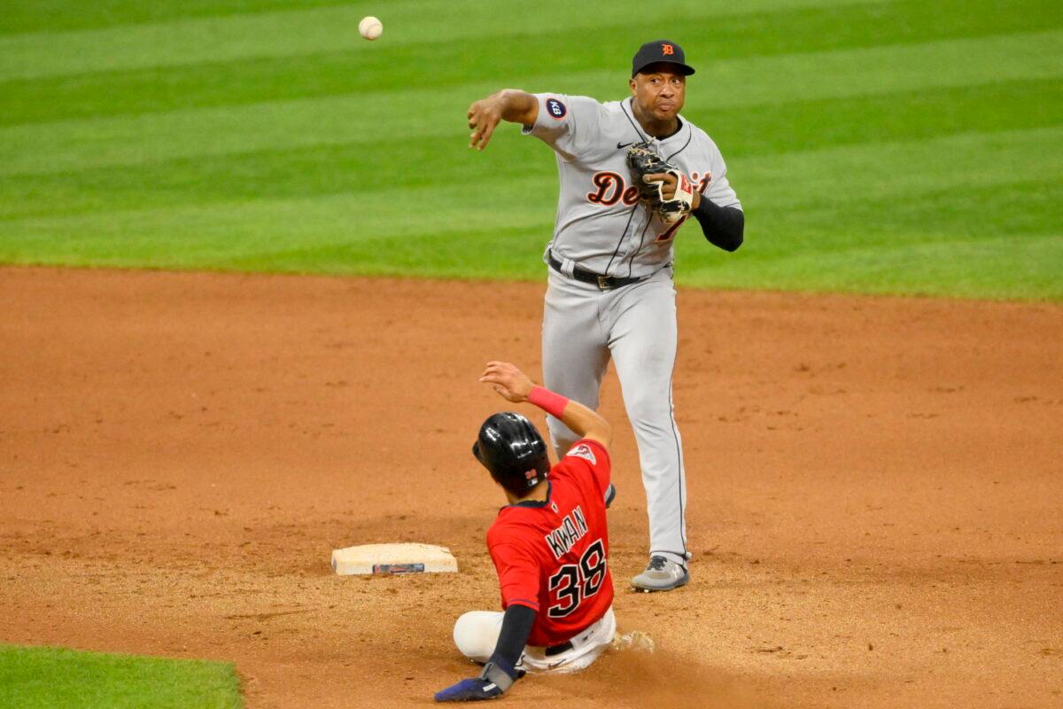 Detroit Tigers second baseman Jonathan Schoop (7) turns a double play over Cleveland Guardians left fielder Steven Kwan (38) in the seventh inning at Progressive Field in Cleveland, Ohio, on Aug 15, 2022. (David Richard/USA TODAY Sports via Field Level Media)