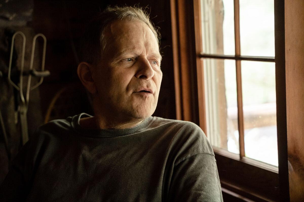 Mark Griffin, who spent more than a year recovering from a massive leg fracture, at his home in Canadensis, Pa., on Aug. 1, 2022. (Petr Svab/The Epoch Times)