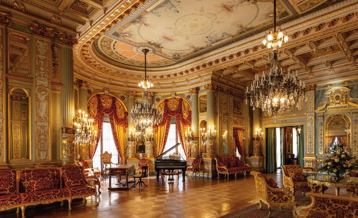 The Music Room showcases a gilt-coffered ceiling lined with silver and gold. This room was featured in the season finale of the HBO series “The Gilded Age.” (Courtesy of The Preservation Society of Newport County)
