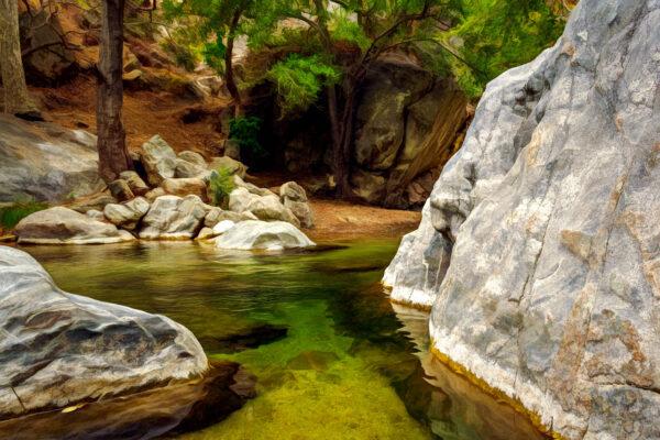 A clear pool ensconced between the massive boulders of Big Sur River Gorge. (Maria Coulson)