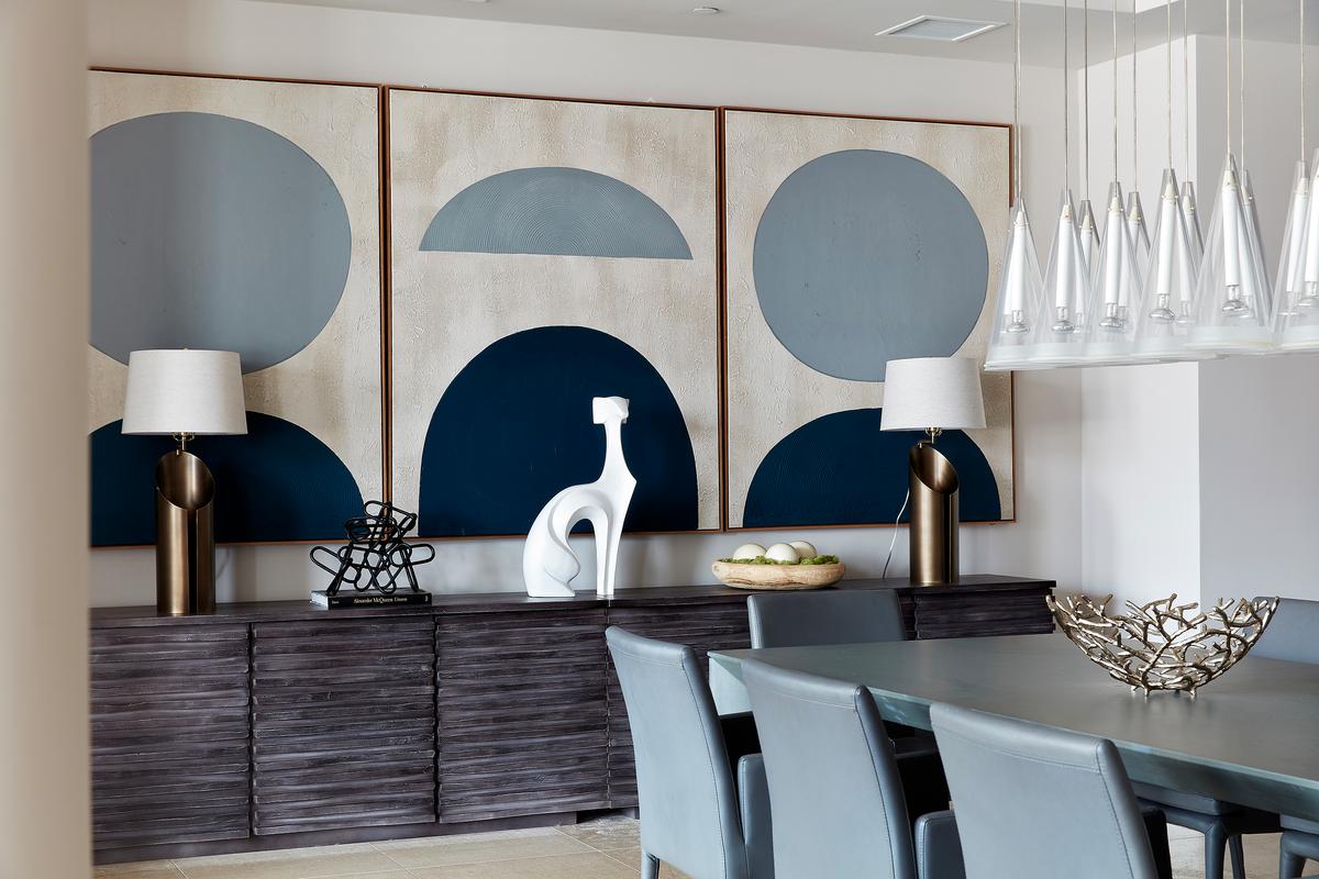 Blue art pieces make a strong statement in this dining space. (Scott Gabriel Morris/TNS)