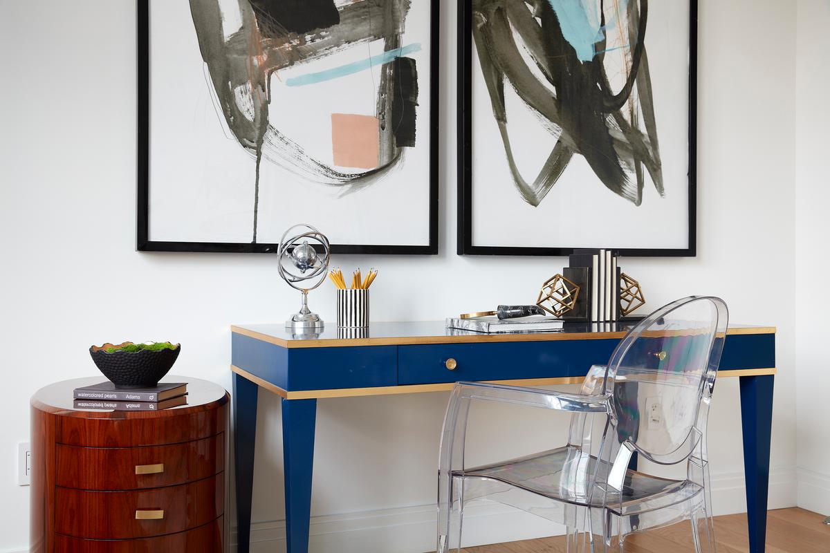 A blue lacquer desk is paired with artwork with hints of blue. (Scott Gabriel Morris/TNS)