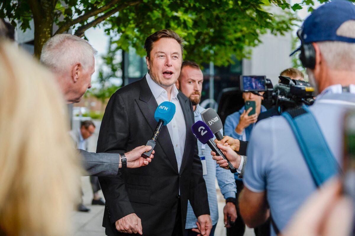Tesla CEO Elon Musk gives interviews as he arrives at the Offshore Northern Seas 2022 meeting in Stavanger, Norway, on Aug. 29, 2022. (Carina Johansen/NTB/AFP via Getty Images)