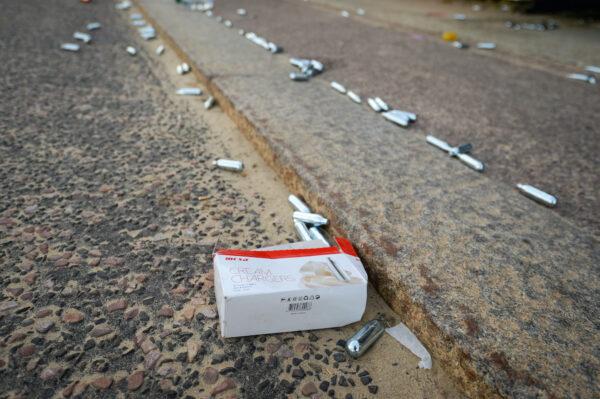 Cartridges that contain Nitrous Oxide gas litter the beach promenade after many visitors leave in Bournemouth, United Kingdom, on June 25, 2020. (Finnbarr Webster/Getty Images)