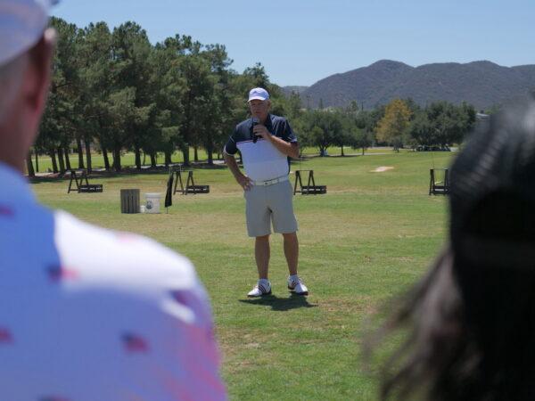 Greg Corlin, member of Bear Creek Golf Club, speaks at nonprofit Folds of Honor's fundraising golf tournament in Temecula, Calif., on Aug. 27, 2022. (Nhat Hoang/The Epoch Times)