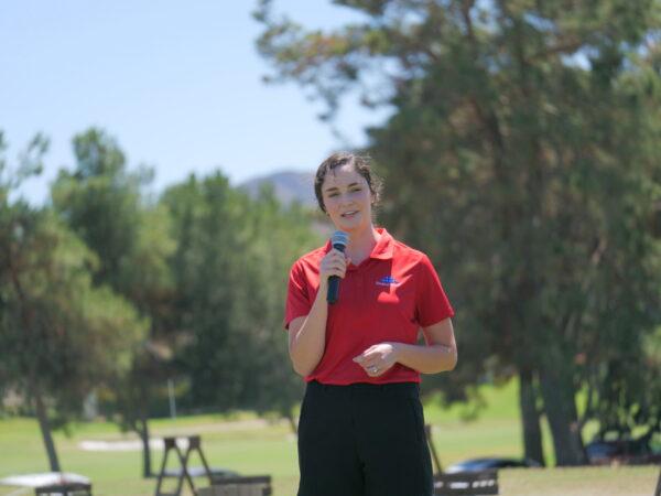 Folds of Honor scholarship recipient Elizabeth Brees speaks before the nonprofit's fundraising golf tournament begins in Temecula, Calif., on Aug. 27, 2022. (Nhat Hoang/The Epoch Times)