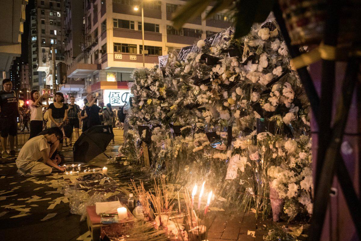 People light candles and burn incense outside Prince Edward MTR station in Hong Kong, on Sept. 7, 2019, a week after the 831 Attack. (Chris McGrath/Getty Images)
