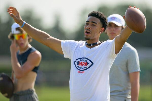 Alabama quarterback Bryce Young runs a drill at the Manning Passing Academy on the Nicholls State University campus in Thibodaux, La., June 24, 2022. (/Matthew Hinton/AP Photo)