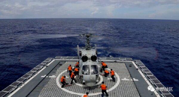 A Navy Force helicopter under the Eastern Theatre Command of the Chinese army takes part in military exercises in the waters around Taiwan, at an undisclosed location, on Aug. 8, 2022. (Eastern Theatre Command/Handout via Reuters)