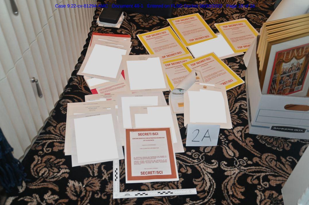 Documents seized during the Aug. 8 raid by the FBI of former President Donald Trump's Mar-a-Lago estate in Palm Beach, Fla., in a photo released on Aug. 30, 2022. (FBI via The Epoch Times)