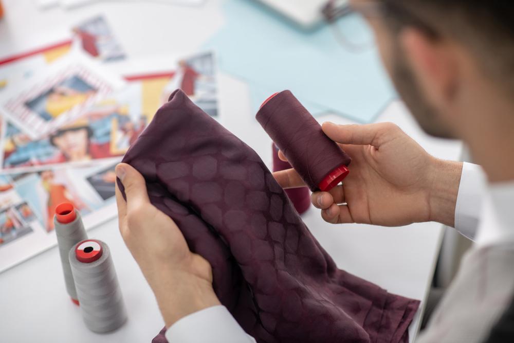 A bespoke tailor can convert the customer’s vision of the ideal shirt into reality, taking into consideration tiny details such as thread preferences. (Dmytro Zinkevych/Shutterstock)
