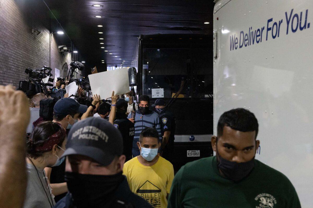 A bus carrying illegal immigrants sent from Texas arrives at Port Authority Bus Terminal in New York on Aug. 10, 2022. (Yuki Iwamura/AFP via Getty Images)