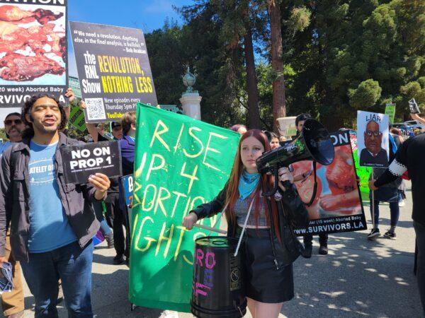 Kristin Turner of Pro-Life San Francisco holds a megaphone at University of California Berkeley on Aug. 26, 2022. (Jason Blair/The Epoch Times)