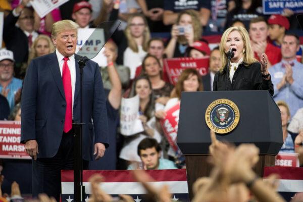  Donald Trump, who was then-U.S. president, and Marsha Blackburn, then a House lawmaker (R-Tenn.) running for Senate, address the crowd during a campaign rally at Freedom Hall in Johnson City, Tennessee, on Oct. 1, 2018. (Sean Rayford/Getty Images)