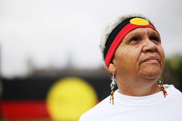 Indigenous Australian looks on after watching the live televsion broadcast from Australian Parliament in Canberra where Australian Prime Minister Kevin Rudd delivered an apology to the Aboriginal people, in Sydney, Australia, on Feb. 13, 2008. (Kristian Dowling/Getty Images)