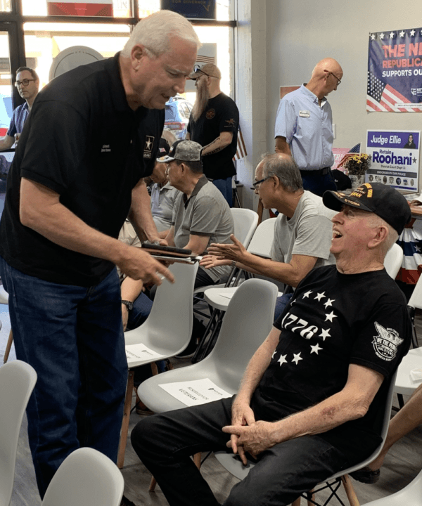 Republican candidate for Nevada Congressional District 1 Mark Robertson speaks on July 28 in Las Vegas speaks with a fellow veteran, a constituency he is appealing to unseat incumbent Democrat Dina Titus (D-Nevada) in their Nov. 8 election. (Courtesy of Robertson for Congress)