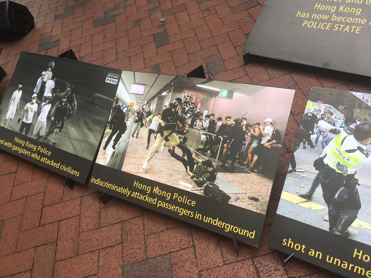 Photo exhibition in Reading. Telling the truth of 8.31 Prince Edward MTR Attack. Aug 20, 2022. (Shan Lam/The Epoch Times)
