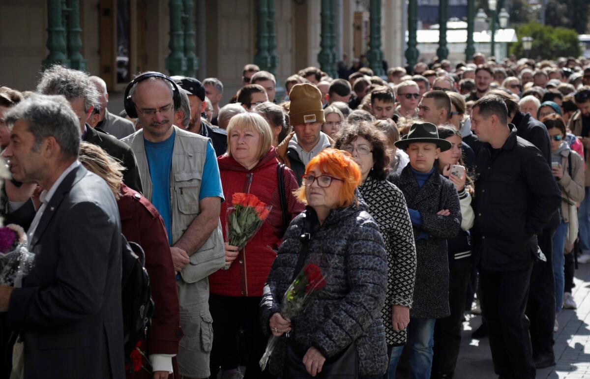 People line up to pay the last respects at the coffin of former Soviet leader Mikhail Gorbachev outside the Pillar Hall of the House of the Unions during a farewell ceremony in Moscow on Sept. 3, 2022. (AP Photo)