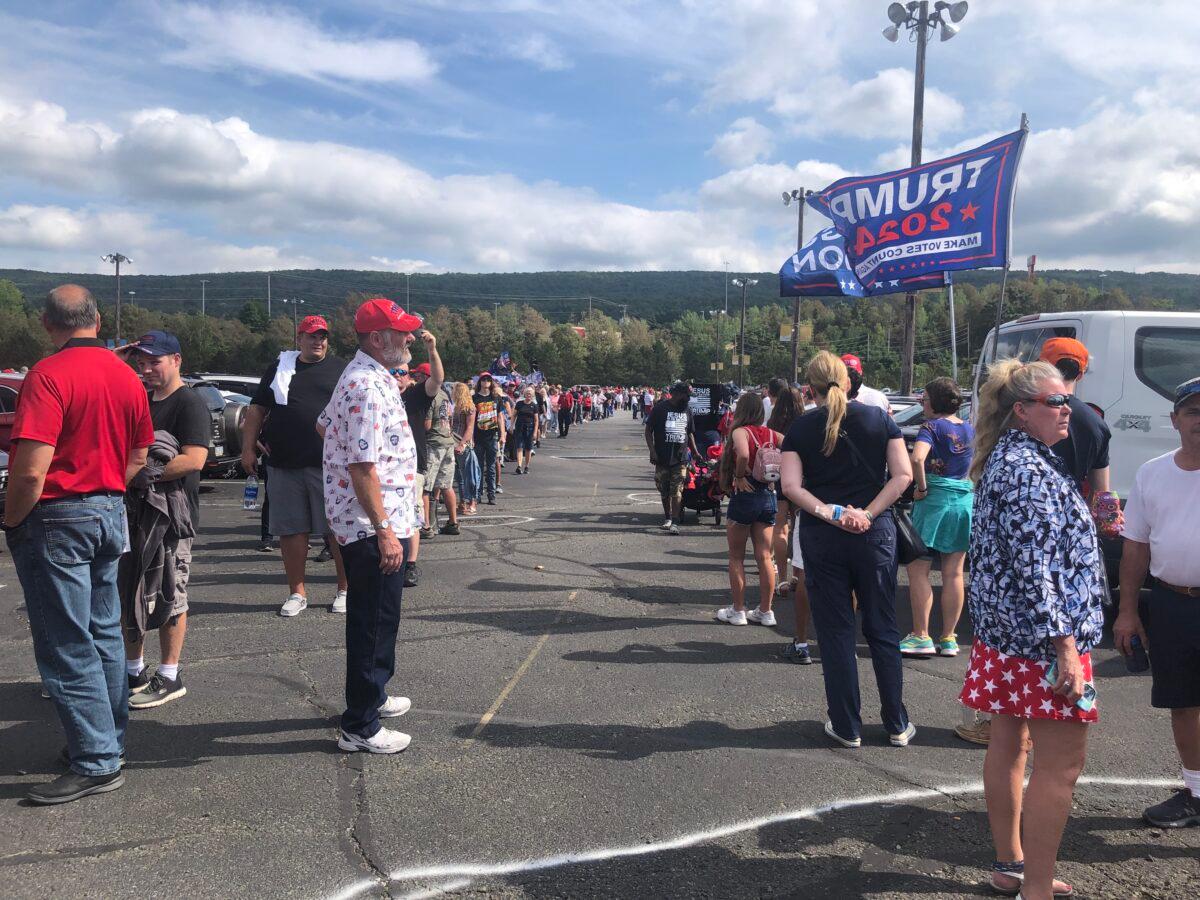 Attendees wait outside the Mohegan Sun Arena in Wilke-Barre, Penn. in advance of Trump’s ‘Save America’ rally on Sept. 4, 2022. (Bill Pan/The Epoch Times)