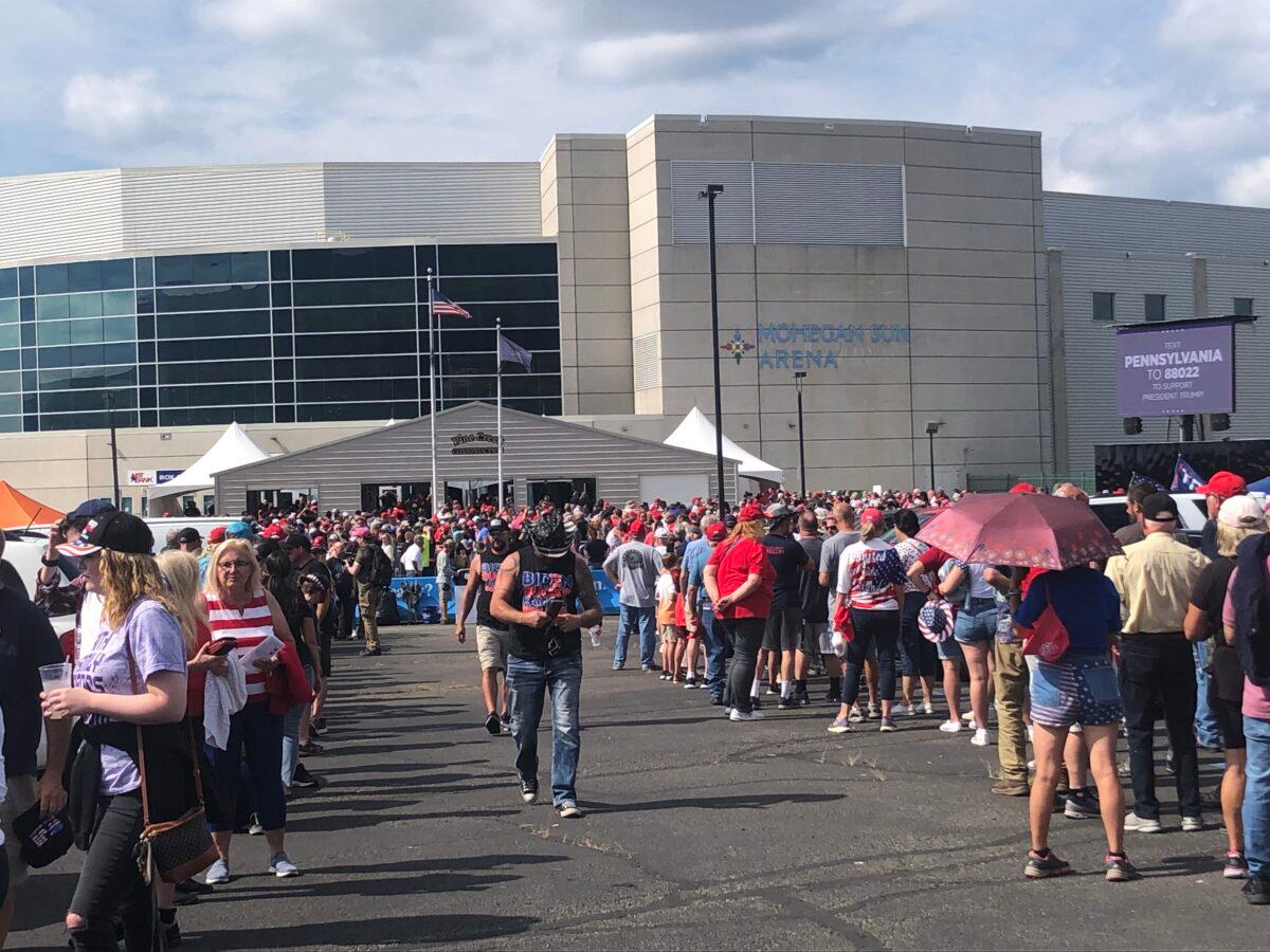 Attendees wait outside the Mohegan Sun Arena in Wilke-Barre, Penn. in advance of Trump’s ‘Save America’ rally on Sept. 4, 2022. (Bill Pan/The Epoch Times)