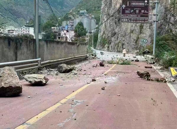 Fallen rocks on a road near Lengqi Town in Luding County of southwest China's Sichuan Province on Sept. 5, 2022. (Xinhua agent via AP)