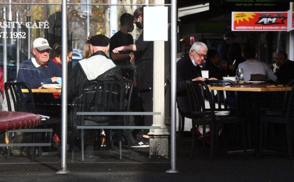 People dine out in Melbourne's Lygon Street cafe and restaurant strip in Melbourne, Australia, on June 11, 2021. (William West/AFP via Getty Images)