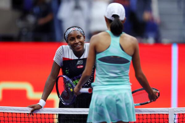 Coco Gauff of the United States hugs Shuai Zhang of China following Gauff's win during their Women's Singles Fourth Round match on Day Seven of the 2022 US Open at USTA Billie Jean King National Tennis Center in the Flushing neighborhood of the Queens borough of New York City on Sept. 4, 2022. (Mike Stobe/Getty Images)