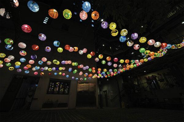 Hundreds of hand-painted lanterns are hung in the Blue House Cluster on Sept. 3, 2022. (T M Chan/The Epoch Times)