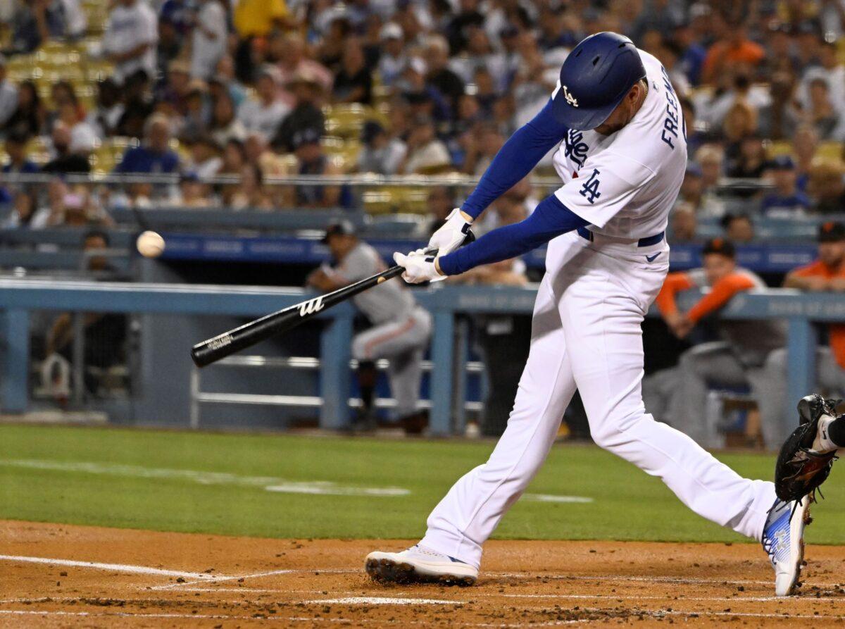 Los Angeles Dodgers' Freddie Freeman hits a two-run home run against the San Francisco Giants during the first inning of a baseball game in Los Angeles on Sept. 5, 2022. (John McCoy/AP Photo)