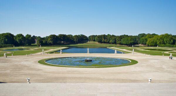 Over 284 acres, the grounds of Chantilly display three types of gardens fashionable at European courts throughout the 17th and 19th centuries: the large French-style flowerbed garden, the Anglo-Chinese garden, and the English-style garden. Ponds reflect the sky with mirrors of water in the French garden, which is also decorated with a large collection of sculptures. Louis II de Bourbon-Condé (1621–1686) commissioned André Le Nôtre to design this garden. Le Nôtre was also the designer of the Versailles gardens, but the Chantilly garden was known to be his favorite.