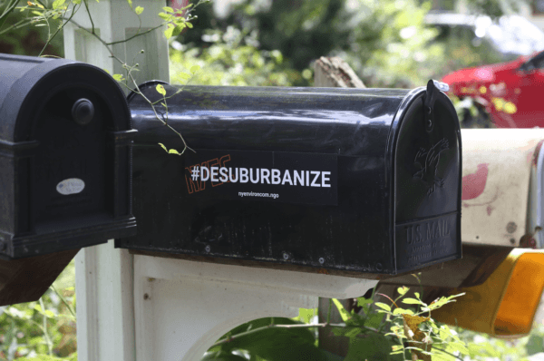 A mailbox at a home owned by Grace Woodard, which now has a sticker on it for Alex Scilla’s organization. (The Epoch Times)