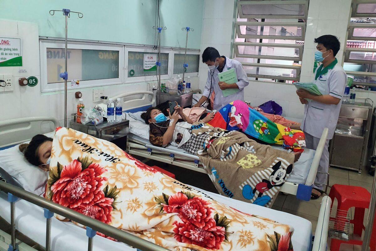 Victims of the karaoke parlor fire are treated in a hospital in Thuan An city, southern Vietnam on Sept. 7, 2022. (Duong Trei Tuong/VNA via AP)
