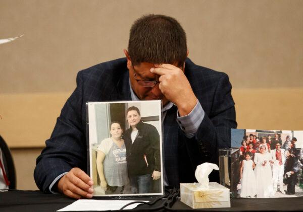 Mark Arcand, brother of James Smith Cree Nation stabbing victim Bonnie Burns, holds a picture of his sister during a news conference in Saskatoon on Sept. 7, 2022. (Cole Burston/AFP via Getty Images)