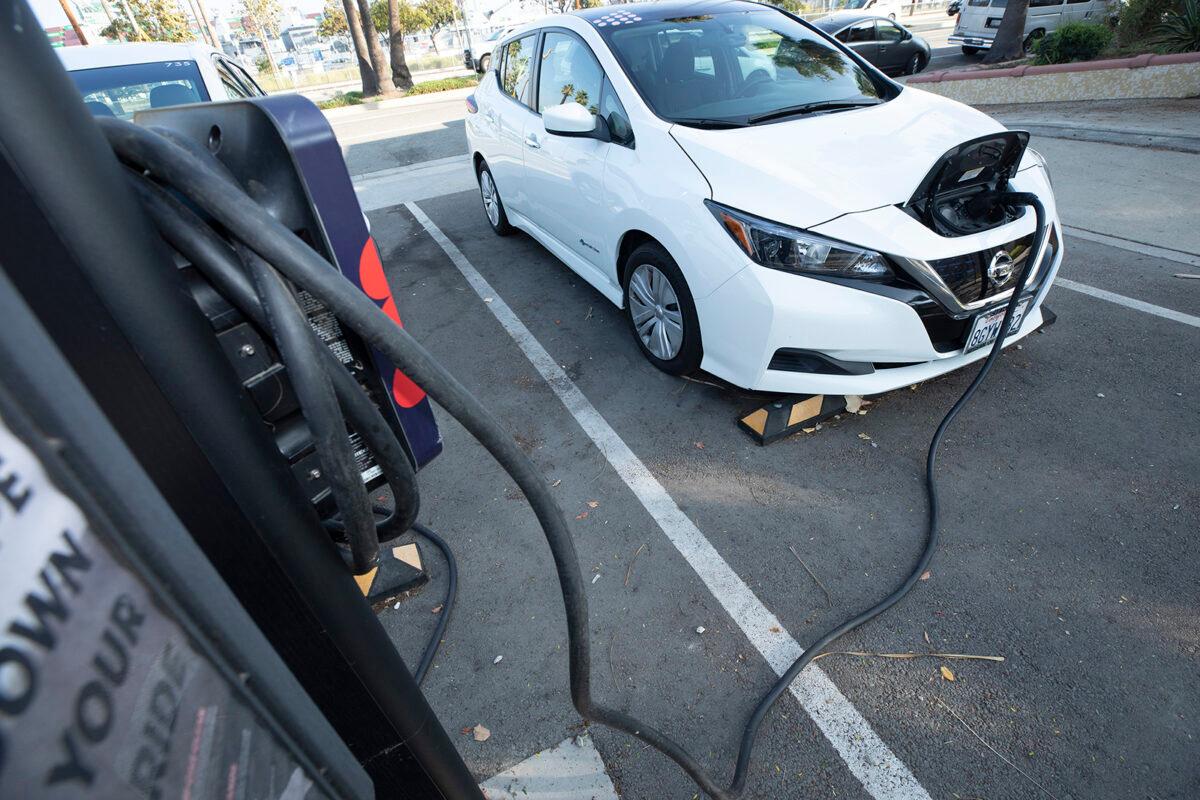 An electric car charges up in San Pedro, Calif., on Dec. 2, 2021. (Myung J. Chun/Los Angeles Times via TNS)