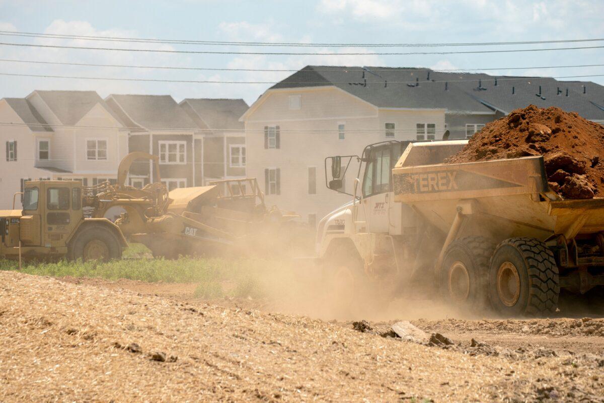 New homes are seen past construction vehicles in Laurel, Md., on June 4, 2022. (Stefani Reynolds/AFP via Getty Images)