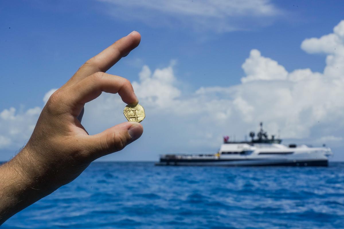 The researchers recovered a gold coin from the debris trail of the Maravillas. (Courtesy of Brendan Chavez/Allen Exploration via <a href="https://www.bahamasmaritimemuseum.com/">Bahamas Maritime Museum</a>).
