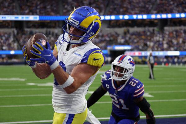 Wide receiver Cooper Kupp (10) of the Los Angeles Rams catches a four-yard touchdown reception ahead of safety Jordan Poyer (21) of the Buffalo Bills during the second quarter of the NFL game at SoFi Stadium in Inglewood, Calif., Sept. 8, 2022. (Harry How/Getty Images)