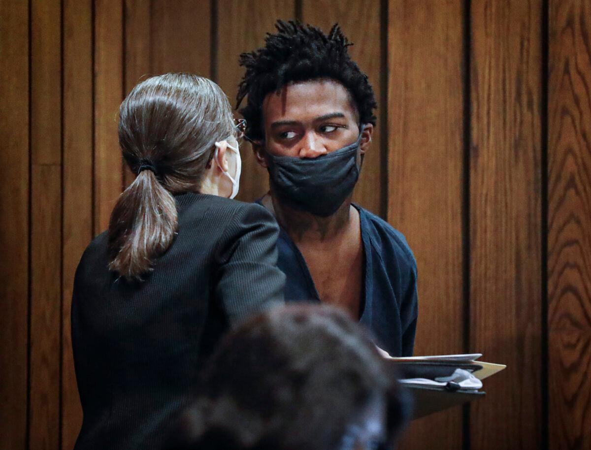 Defendant Ezekeil Kelly (R) talks with a lawyer with the public defenders office while making his first court appearance in Memphis, Tenn., on Sept. 9, 2022. (Mark Weber/Daily Memphian via AP)