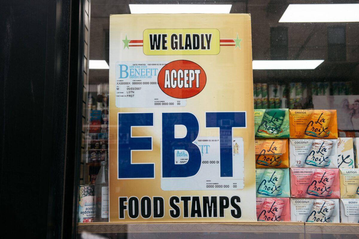 A sign alerting customers about SNAP food stamps benefits at a Brooklyn grocery store in New York on Dec. 5, 2019. (Scott Heins/Getty Images)
