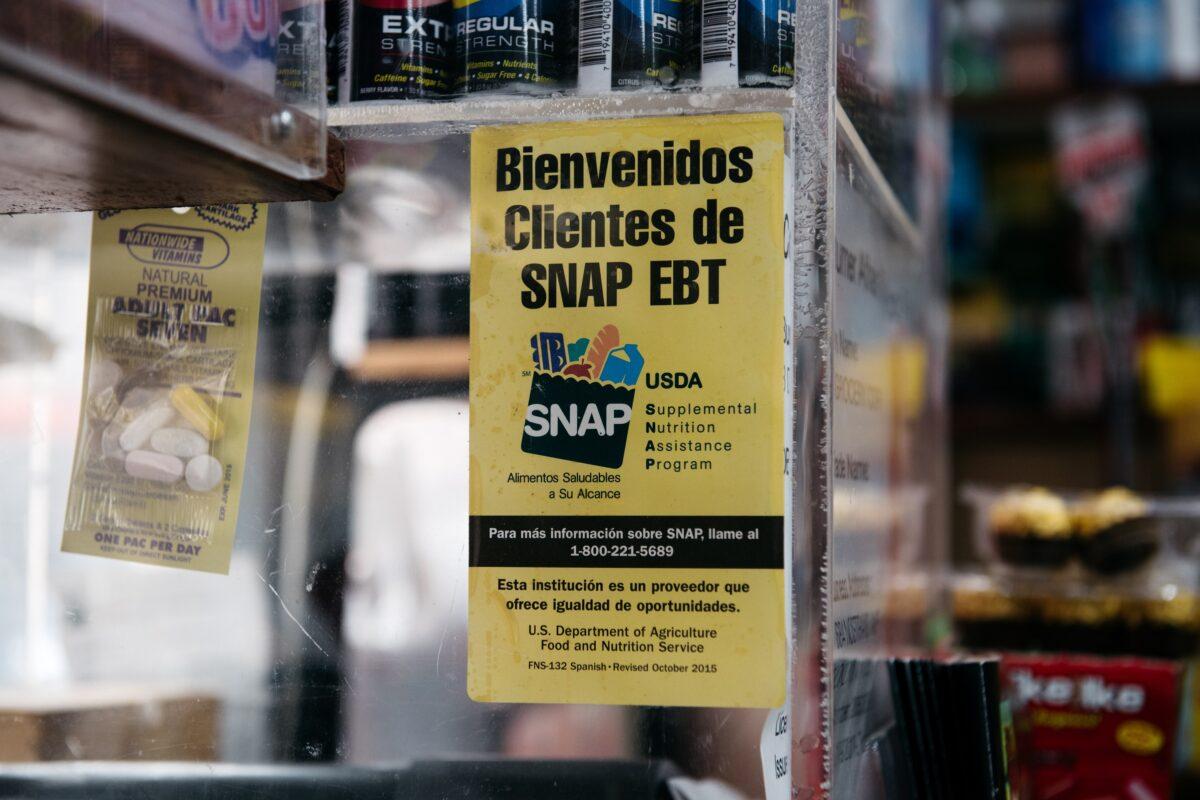 A sign alerting customers about SNAP food stamps benefits in a Brooklyn grocery store in New York on Dec. 5, 2019. (Scott Heins/Getty Images)