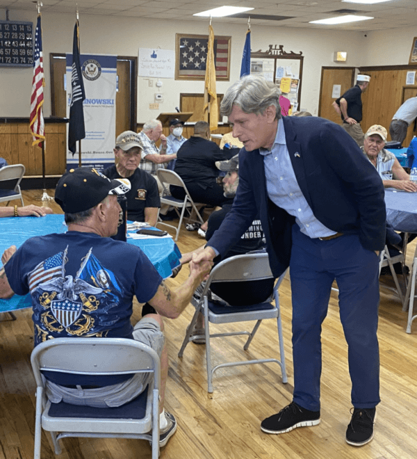 Two-term New Jersey 7th Congressional District Democratic incumbent Rep. Tom Malinowski (D-N.J.) shakes hands with a veteran at VFW Post 5119 in Glen Gardner, N.J., during a recent campaign meet-and-greet. (Courtesy of Tom Malinowski for Congress)