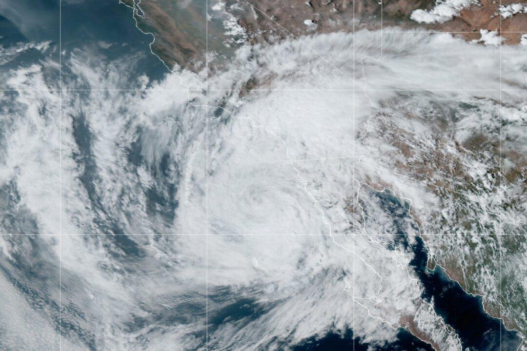 Tropical Storm Threatens to Fan California Wildfires, but Will Cool Off State
