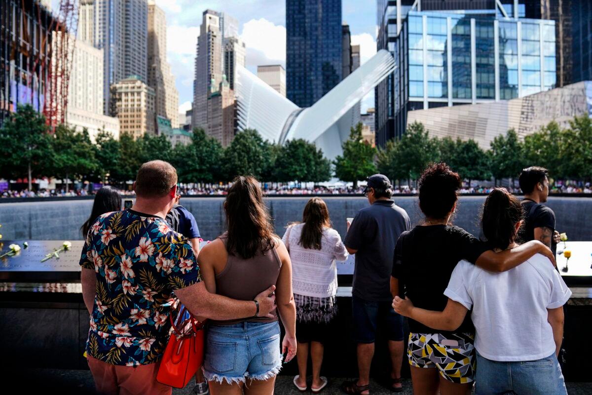 Members of the public arrive at the south pool after the conclusion of ceremonies to commemorate the 20th anniversary of the Sept. 11 terrorist attacks, Sept. 11, 2021, at the National September 11 Memorial & Museum, in New York on Sept. 11, 2022. (Matt Rourke/AP Photo)