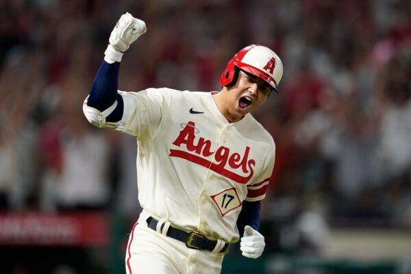 Los Angeles Angels designated hitter Shohei Ohtani (17) reacts as he runs the bases after hitting a home run during the sixth inning of a baseball game against the New York Yankees in Anaheim, Aug. 31, 2022. (Ashley Landis/ AP Photo)