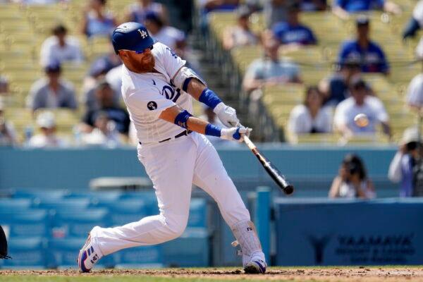 Los Angeles Dodgers' Justin Turner connects for a three-run home run during the fifth inning of a baseball game against the San Francisco Giants in Los Angeles, on Sept. 7, 2022. (Marcio Jose Sanchez/AP Photo)