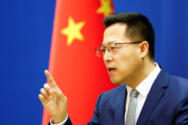 Chinese Foreign Ministry spokesperson Zhao Lijian speaks during a press conference in Beijing on March 18. (Carlos Garcia Rawlins/REUTERS)