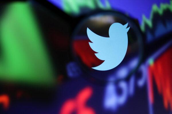 Twitter logo and stock graph are seen through a magnifier displayed in this illustration taken Sept. 4, 2022. (Dado Ruvic/Reuters)