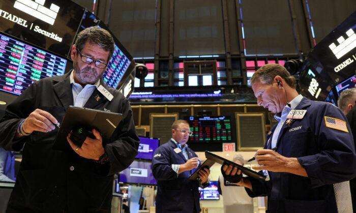 Wall Street Opens Higher on Tech Boost
